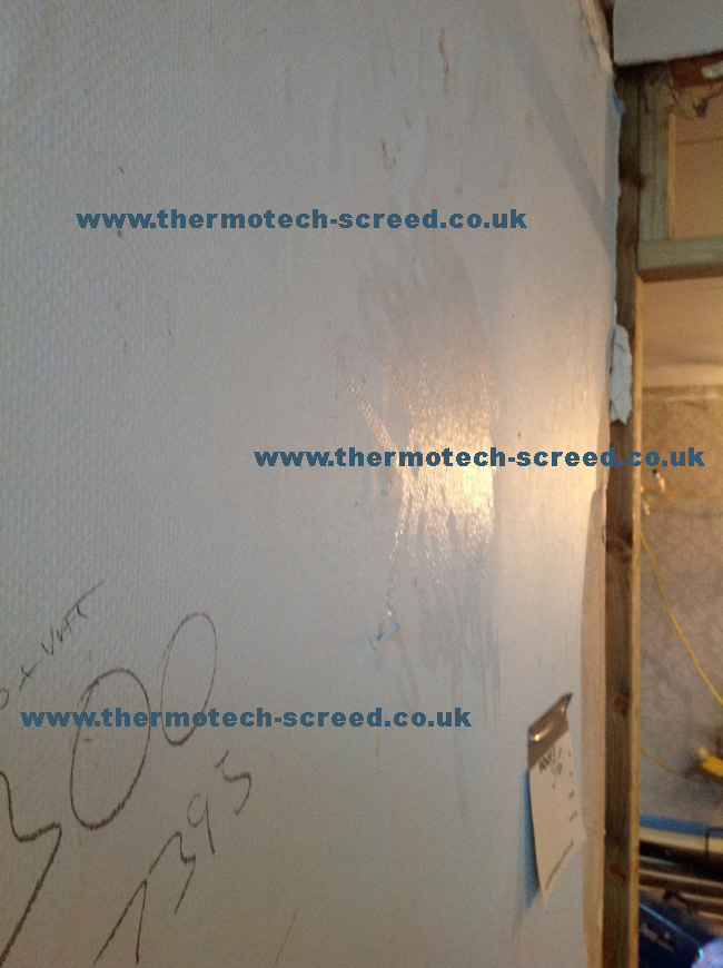 Condensation on internal walls prior to screeding due to poor build management allowing excess moisture to accumulate within the property and inhibit drying. 