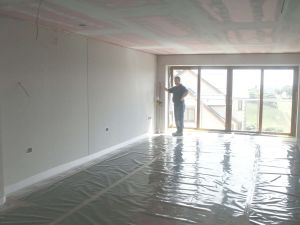 The insulation covered with a vapour barrier taped into place.